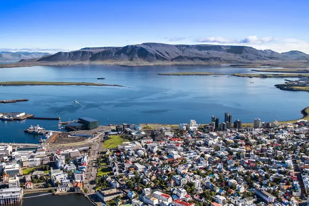 Aerial view of Reykjavík harbour with Mount Esja across the bay